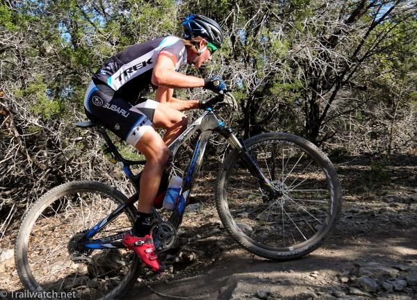 Sam Schultz (Subaru Trek) rides over a steep lip in the trail