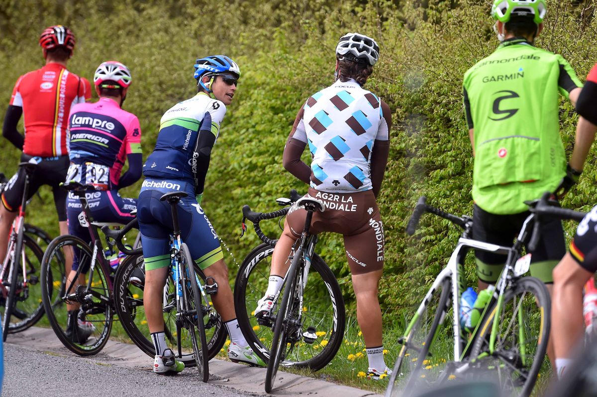 Esteban Chaves and Carlos Betancur enjoy a chat mid-nature break