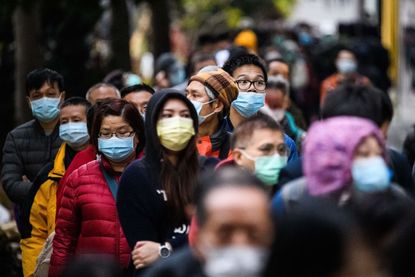 People wearing facemasks as a preventative measure following a coronavirus outbreak which began in the Chinese city of Wuhan