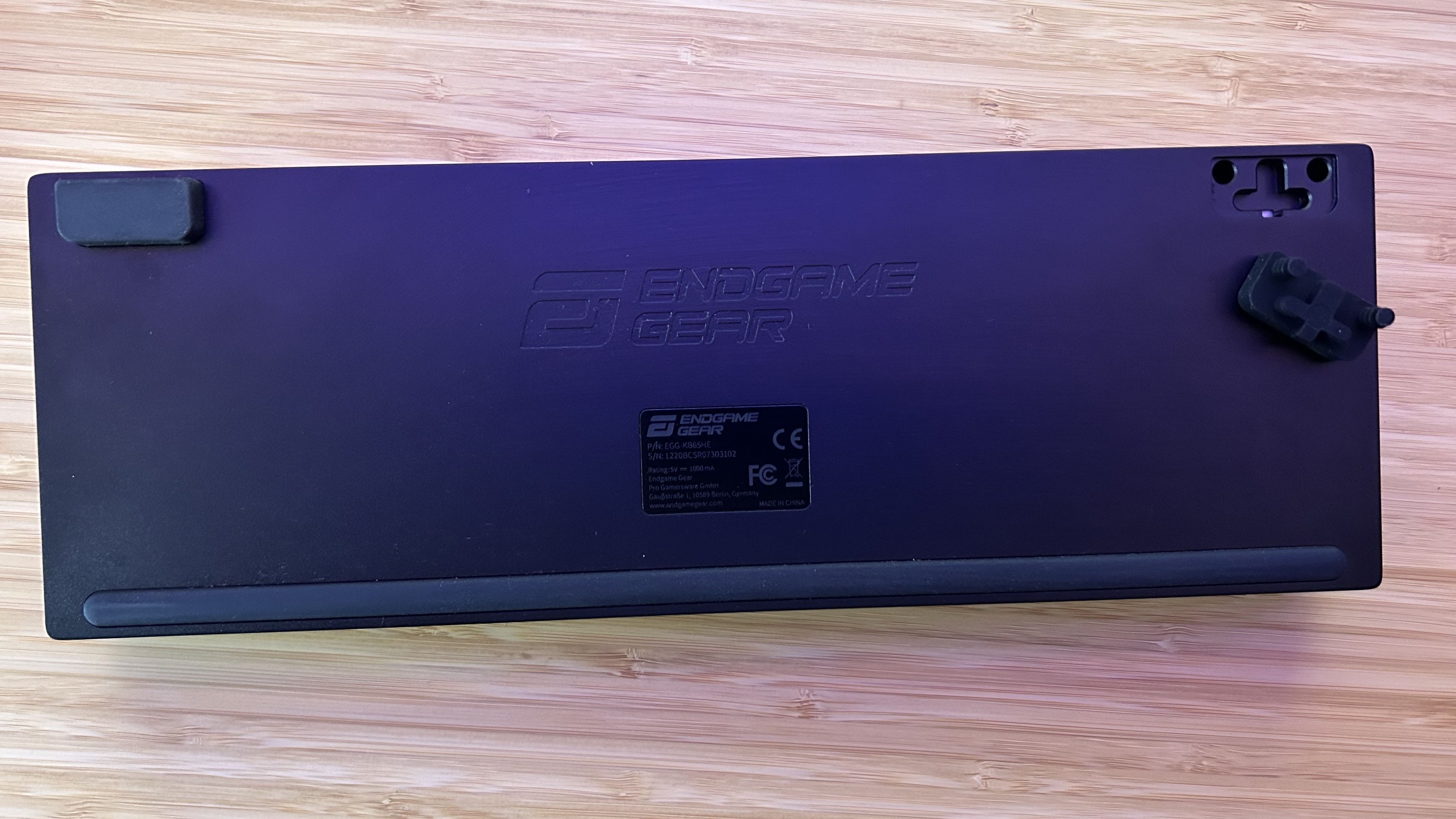 Back of Endgame Gear keyboard showing rubber feet with one removed