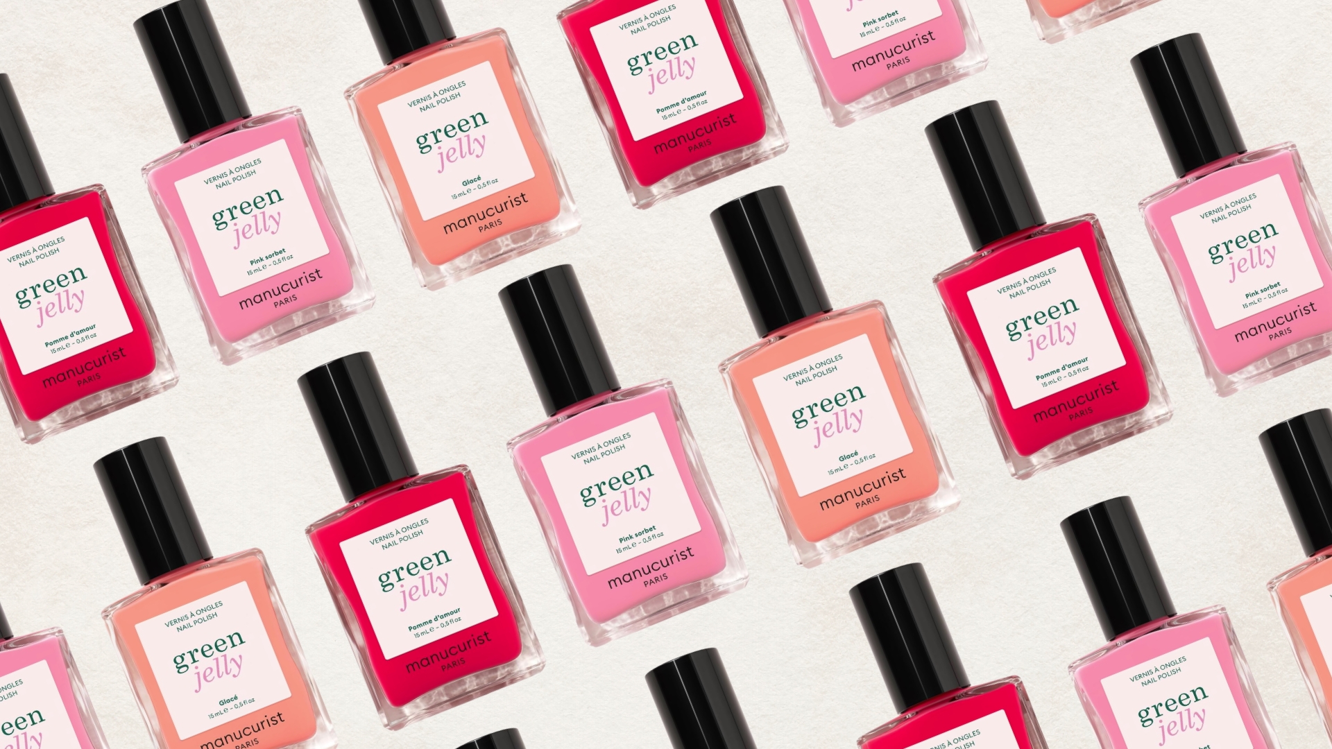 A collage featuring some of the new Manucurist Jelly Nail Polishes arranged in a diagonal repeated line pattern, on a cream template.