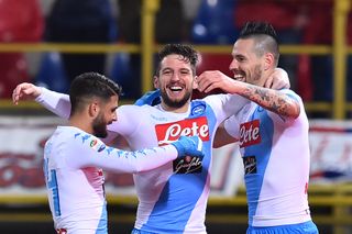 Marek Hamsik (right) celebrates a Napoli goal against Bologna with Lorenzo Insigne (left) and Dries Mertens in February 2017.