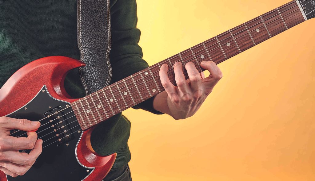 How to play the Bond guitar chord: the spy chord is back - learn it ...