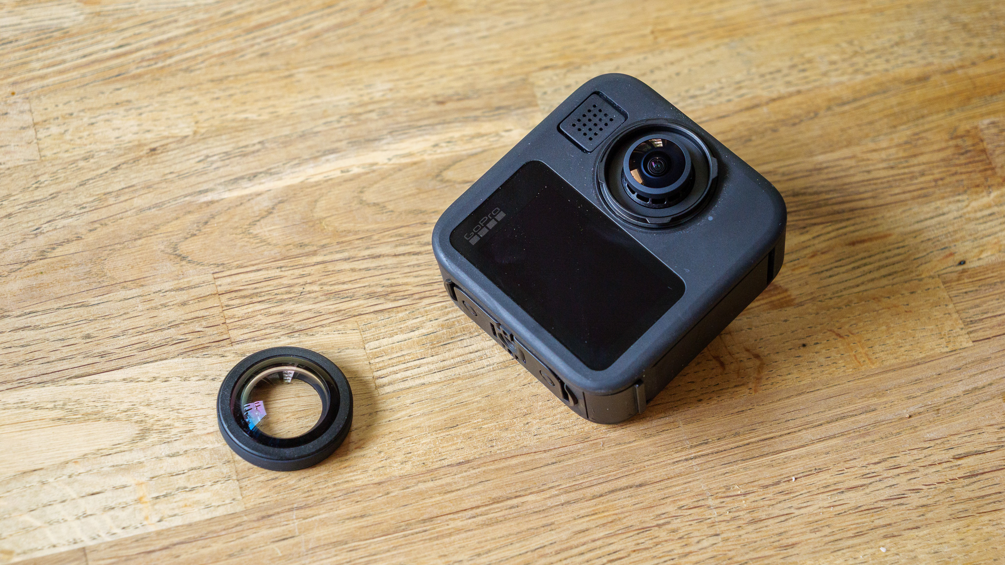 GoPro Max 2 with removed lens on wooden table