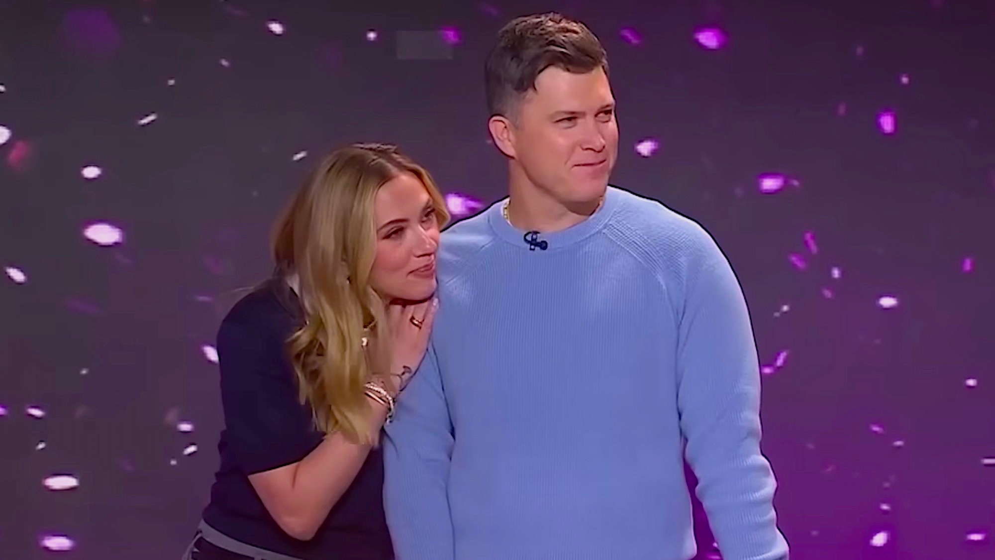 Scarlett Johansson leaning on husband Colin Jost's shoulder while they are playing a game on The TODAY Show.