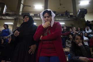 Egyptian Coptic Christians gather for a Christmas Eve mass in a chapel at the St. Saman Monastery in Cairo, Egypt, on Jan. 6, 2014.