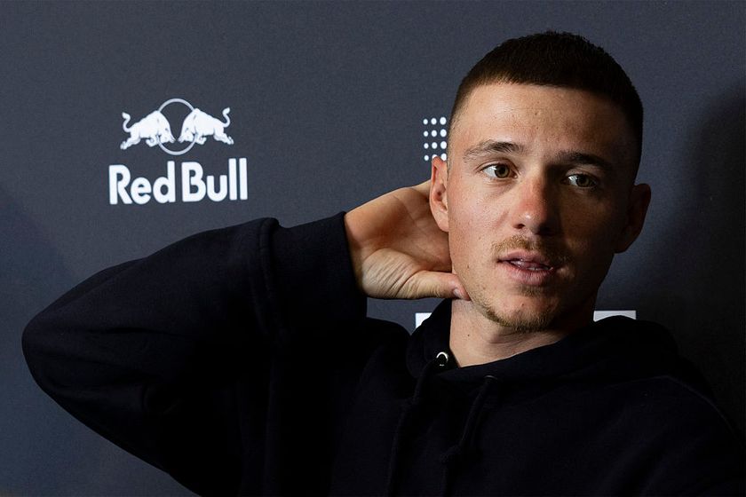 Red Bull&ndash;Bora&ndash;Hansgrohe&rsquo;s Belgium rider Remco Evenepoel speaks during a press conference in the media day of their new team in Binissalem on Mallorca Island on December 10, 2025. (Photo by Jaime REINA / AFP)