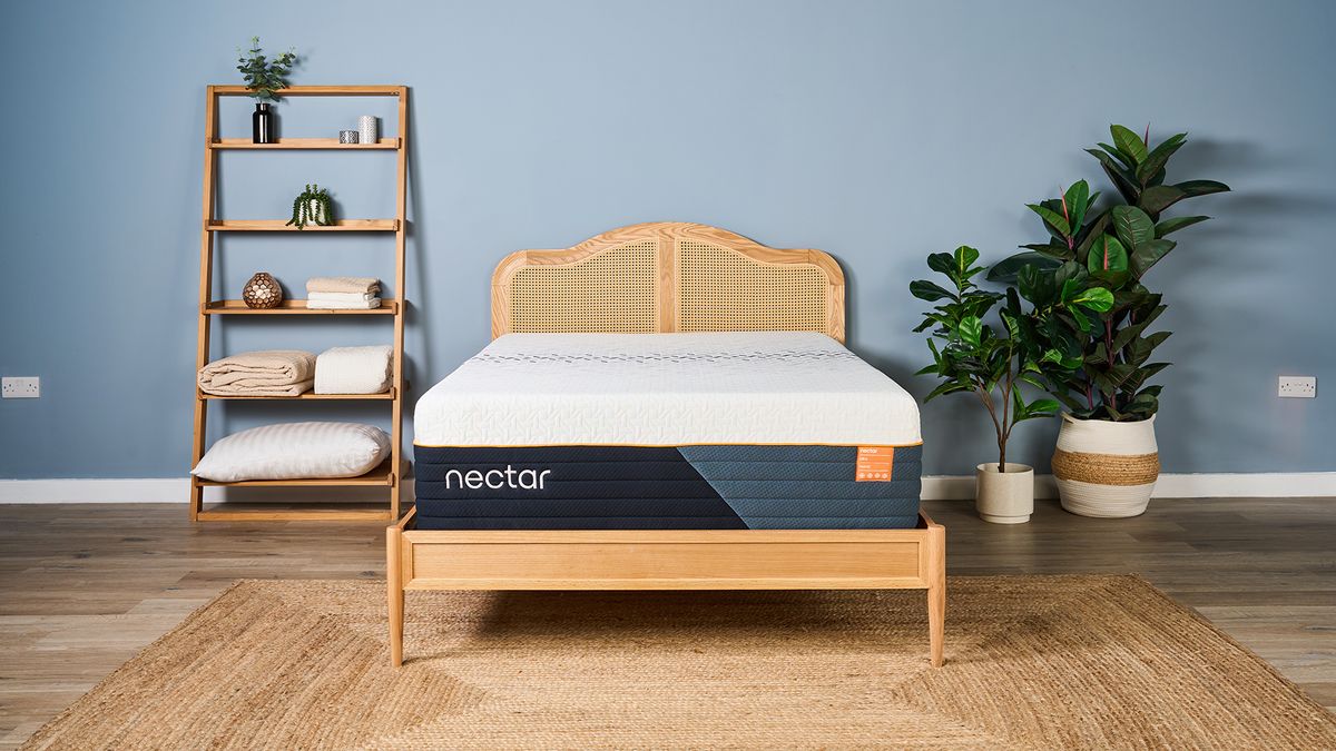 The Nectar Ultra Hybrid Mattress on a bed frame in a bedroom