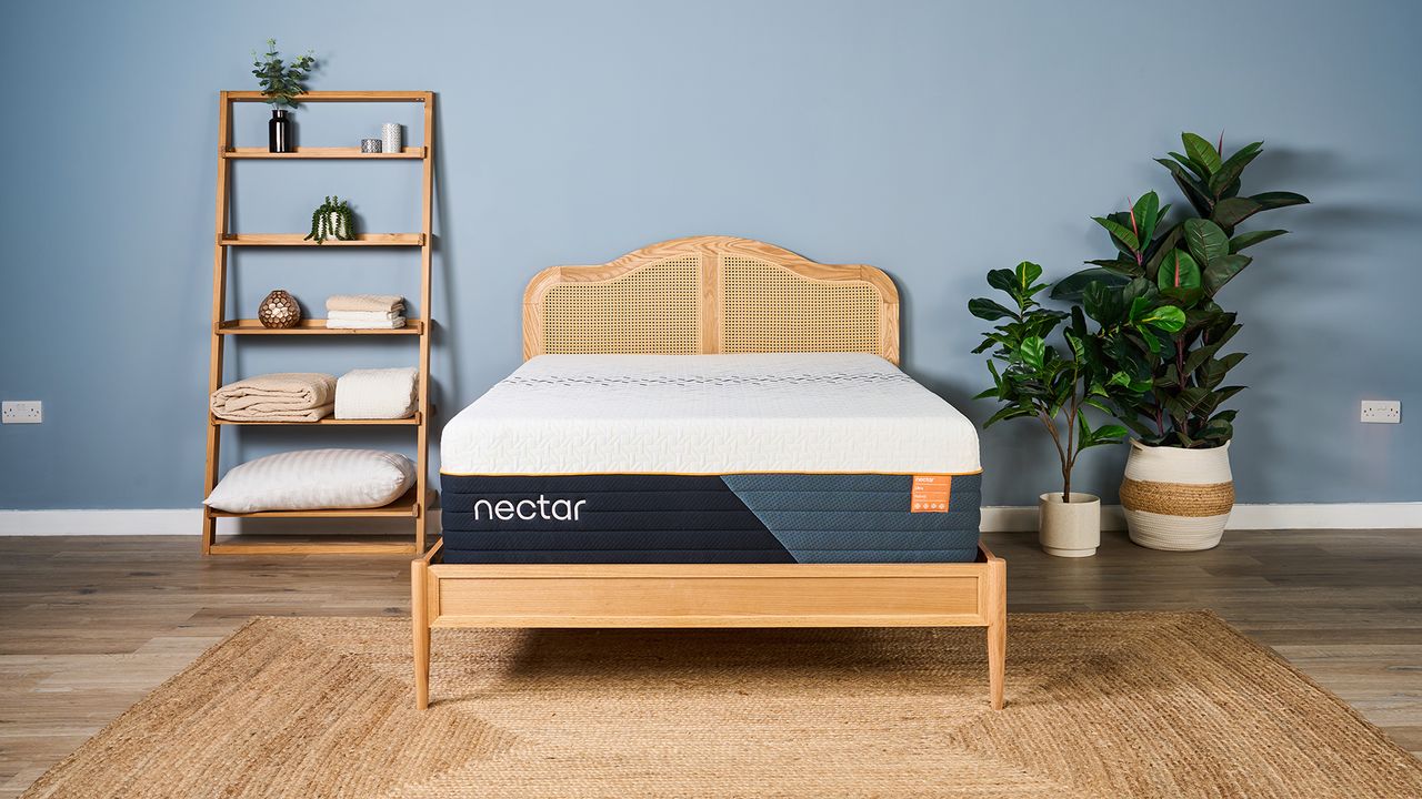 The Nectar Ultra Hybrid Mattress on a bed frame in a bedroom