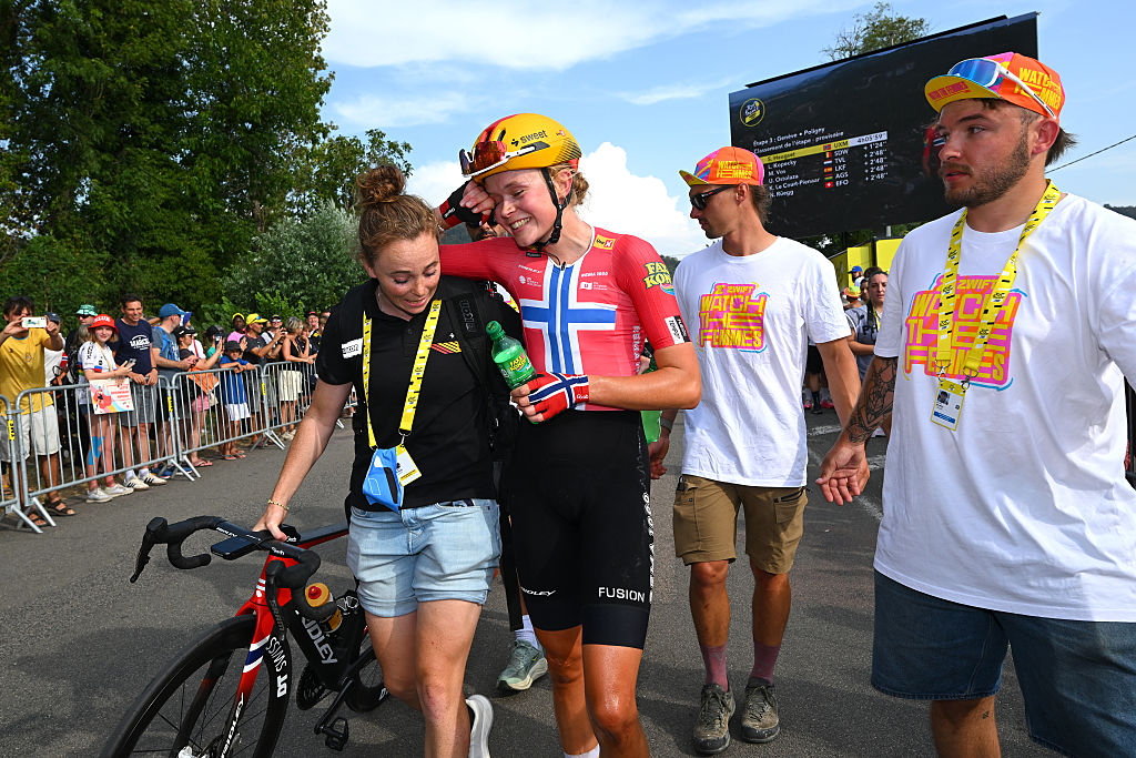 Haugset with team staff after winning the stage