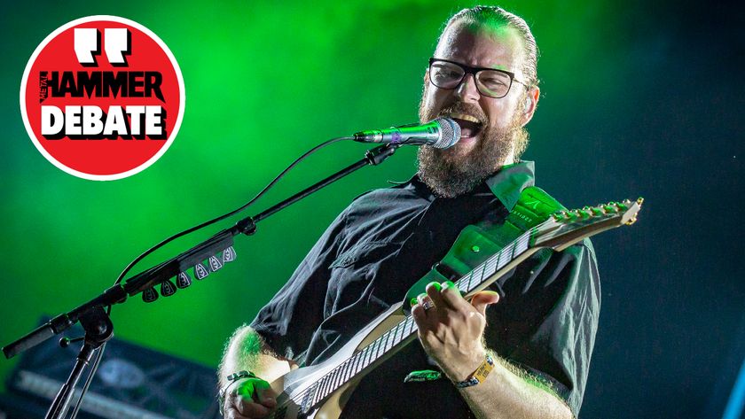 Ihsahn performing onstage with Emperor in 2018