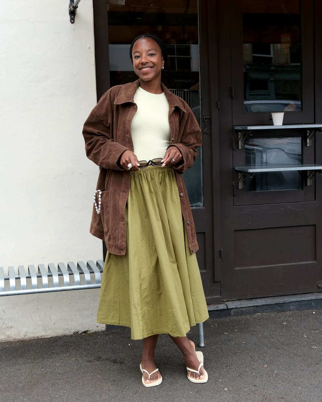 @taffymsipa wears Free People's Lowen Midi Skirt in 'Cardamom Seed'