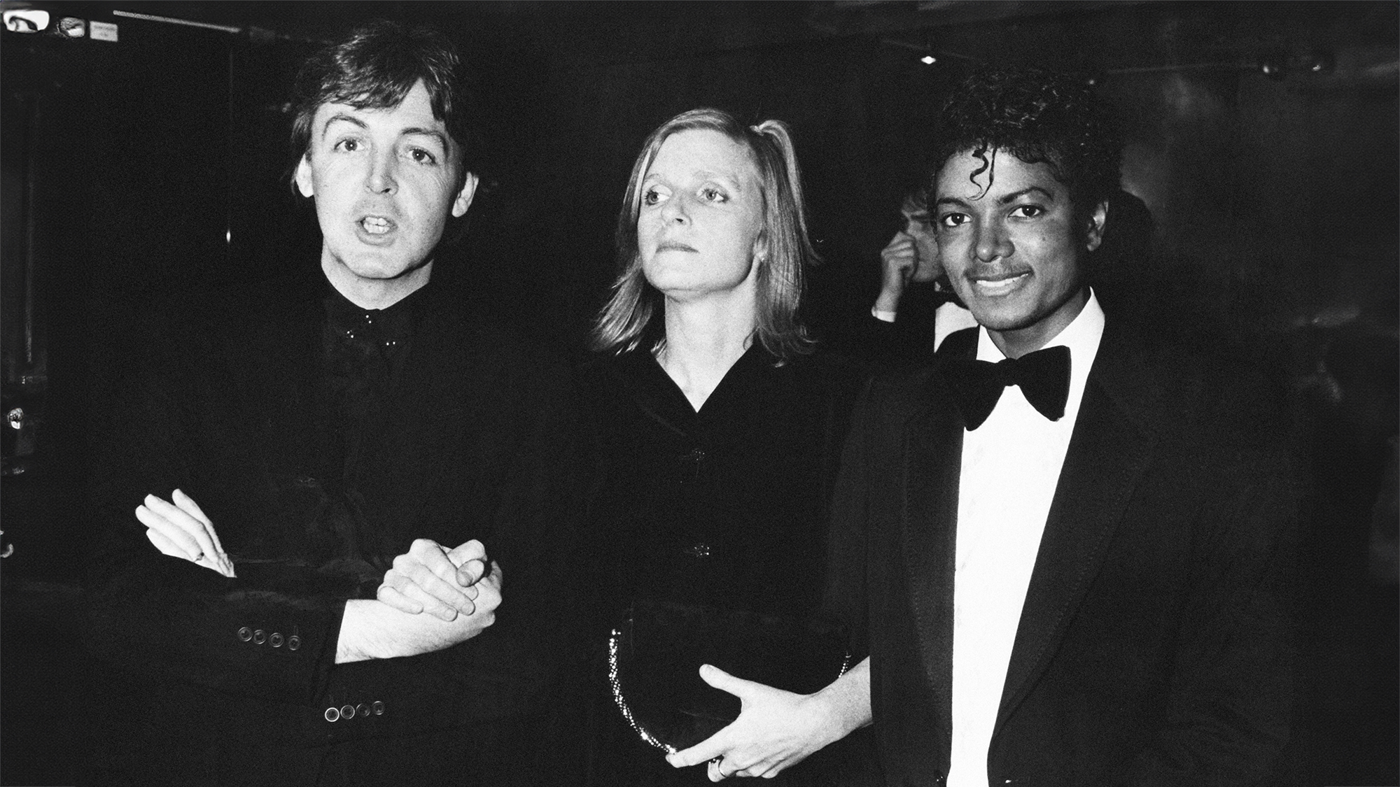 From left to right, Paul McCartney poses with his wife Linda and Michael Jackson (1958 - 2009) at the British Record Industry Awards (BRIT awards) in London, 16th February 1983. McCartney had won three awards, the Sony award for Technical Excellence, Best British Male Solo Artist and Outstanding Contribution to Music (this last on behalf of the Beatles).