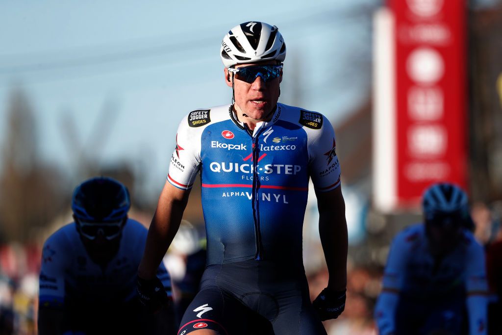 KUURNE BELGIUM FEBRUARY 27 Fabio Jakobsen of Netherlands and Team QuickStep Alpha Vinyl celebrates at finish line as race winner ahead of Caleb Ewan of Australia and Team Lotto Soudal and Hugo Hofstetter of France and Team Arka Samsic during the 74th Kuurne Bruxelles Kuurne 2022 a 1951km race from Kuurne to Kuurne KuurneBxlKuurne on February 27 2022 in Kuurne Belgium Photo by Bas CzerwinskiGetty Images