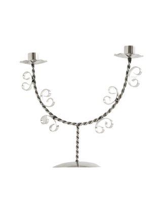 Twist nickel-plated candleholder with floral motifs.