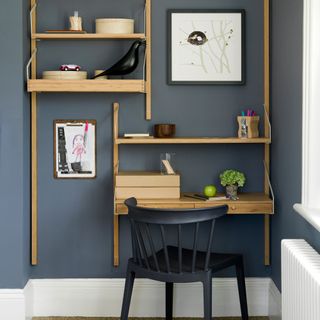 Blue home office with wooden desk