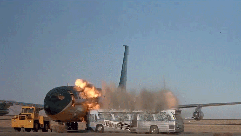 GIF of a bus crashing into an exploding aircraft in Speed