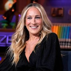 a white woman with long, blonde hair pictured on a talk show set