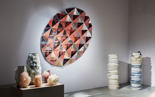 A larger wall piece by Sam Orlando Miller was also on display, next to Lukas Wegwerth ceramics with crystal clusters and Johannes Nagel's totems