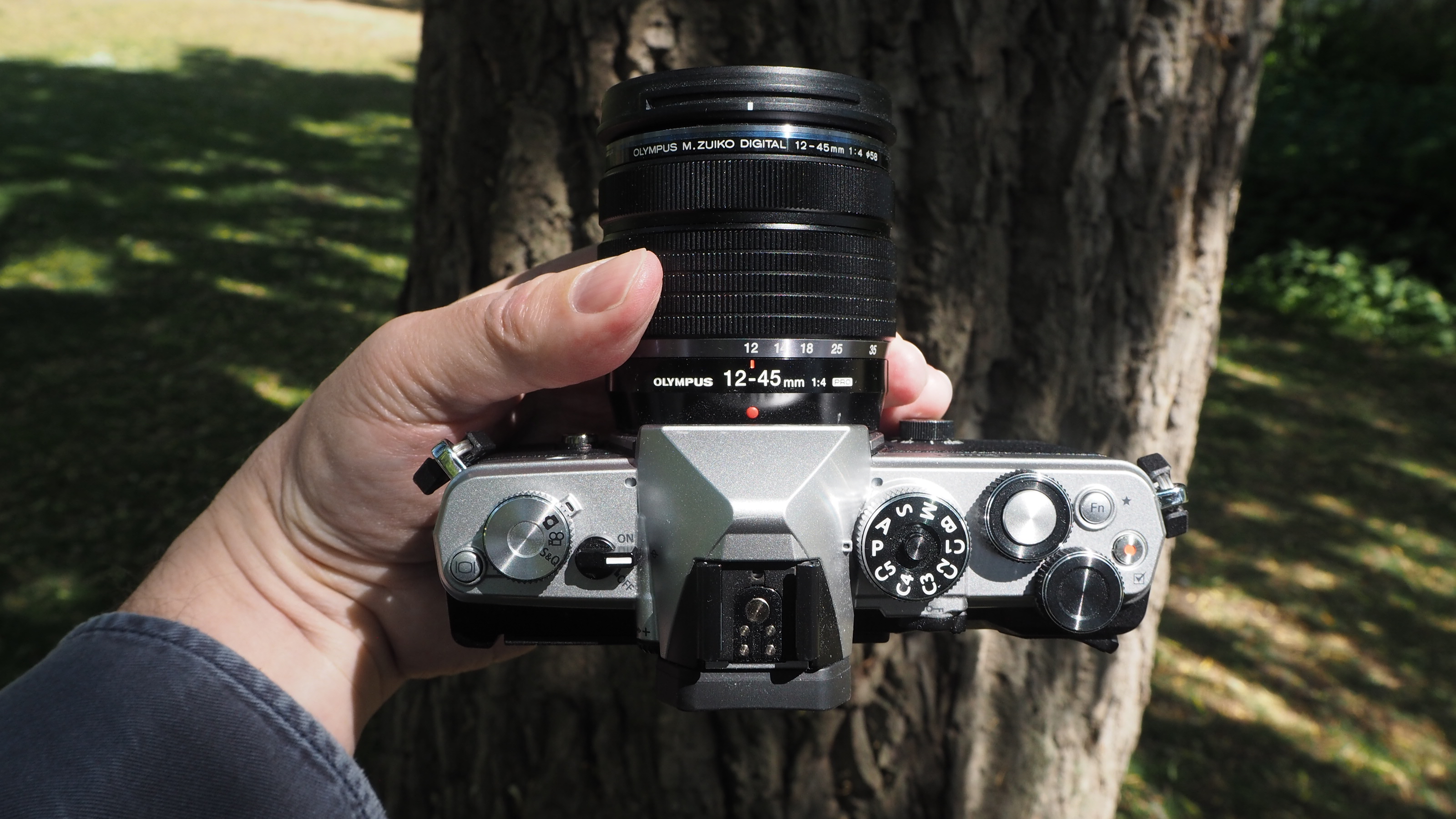 OM System OM-3 in the hand