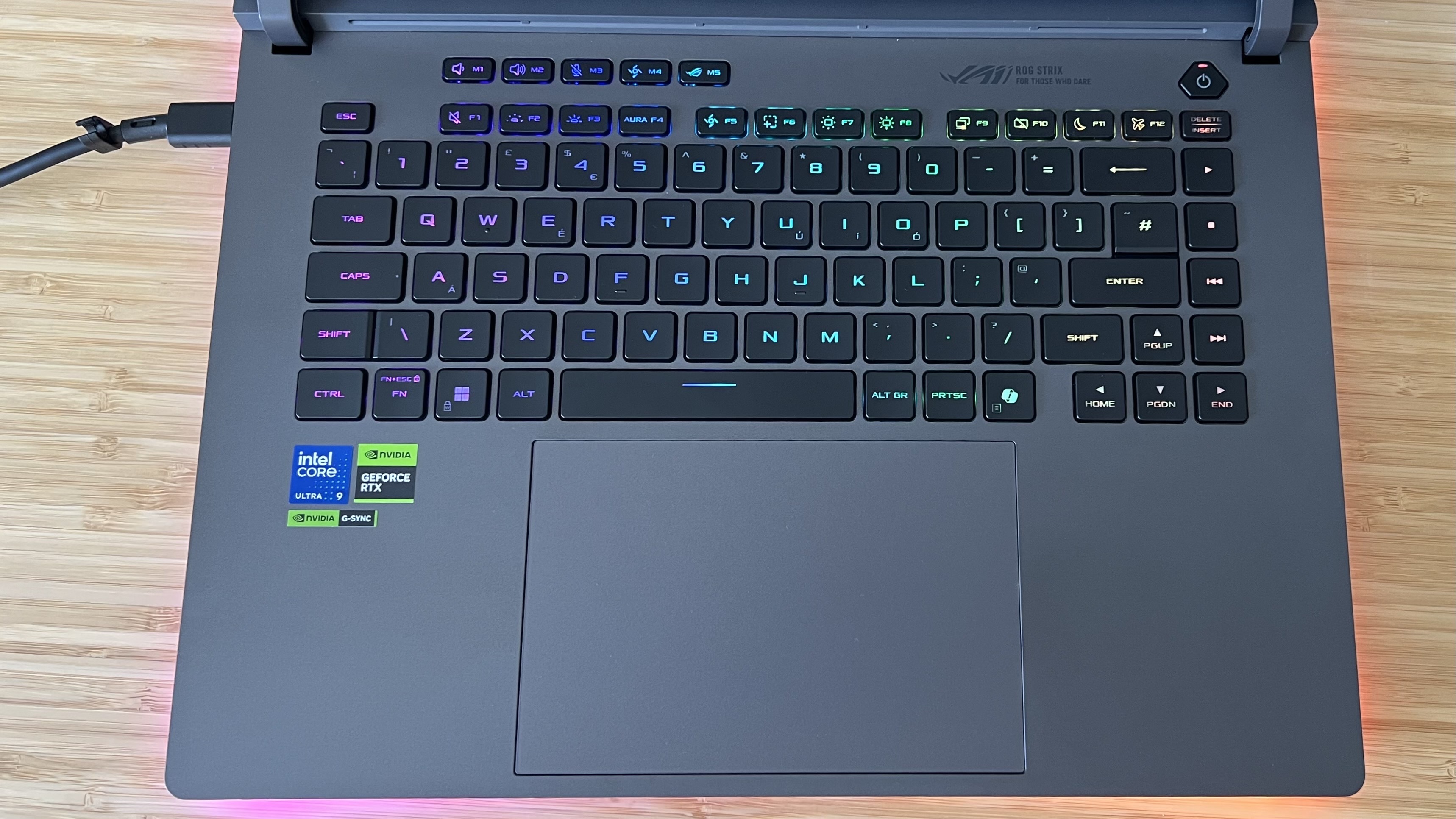 Top down view of keyboard and trackpad on Asus ROG Strix G16 gaming laptop