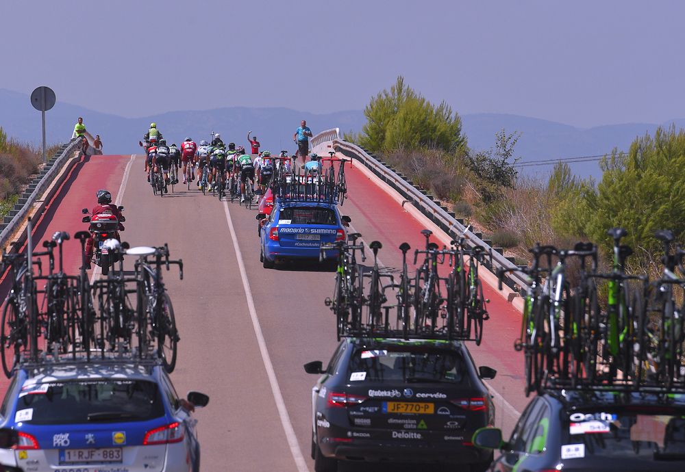 The caravan stacks up behind the race