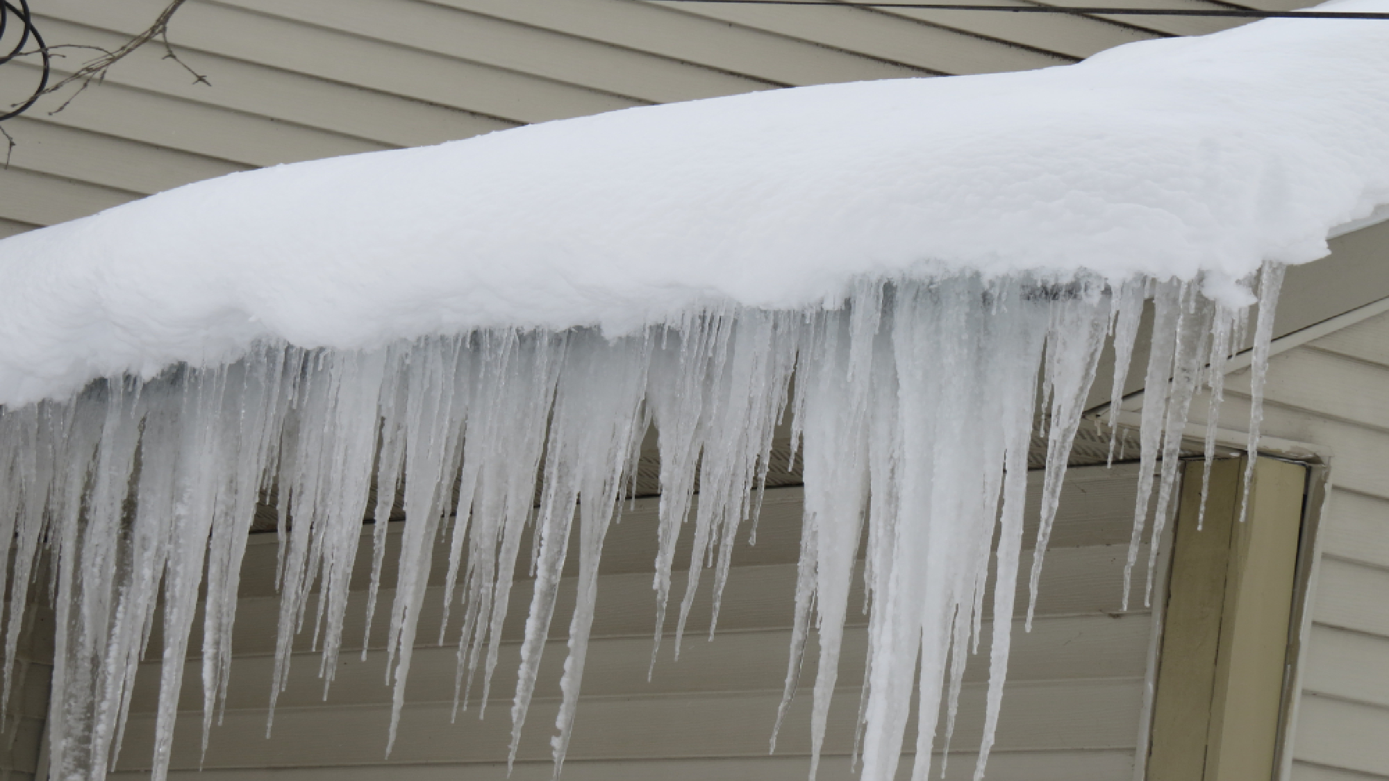 Snow and icicles on roof