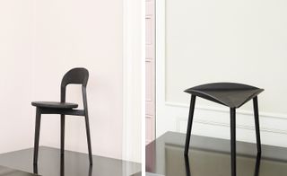 Black colour chair and stool in the Room.