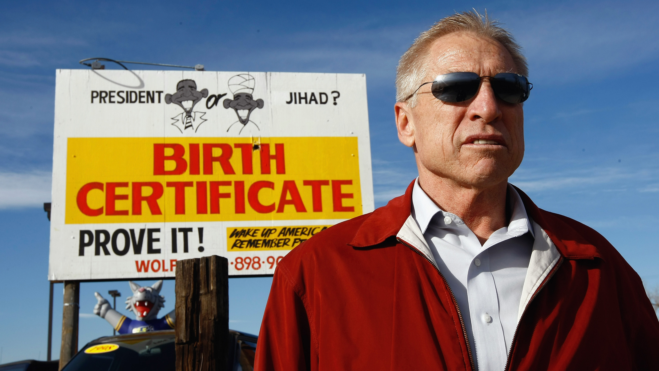 Phil Wolf, owner of a used car dealership, paid $2,500 to have this “birther” billboard painted, shown here on Nov. 21, 2009 in Wheat Ridge, Colorado.