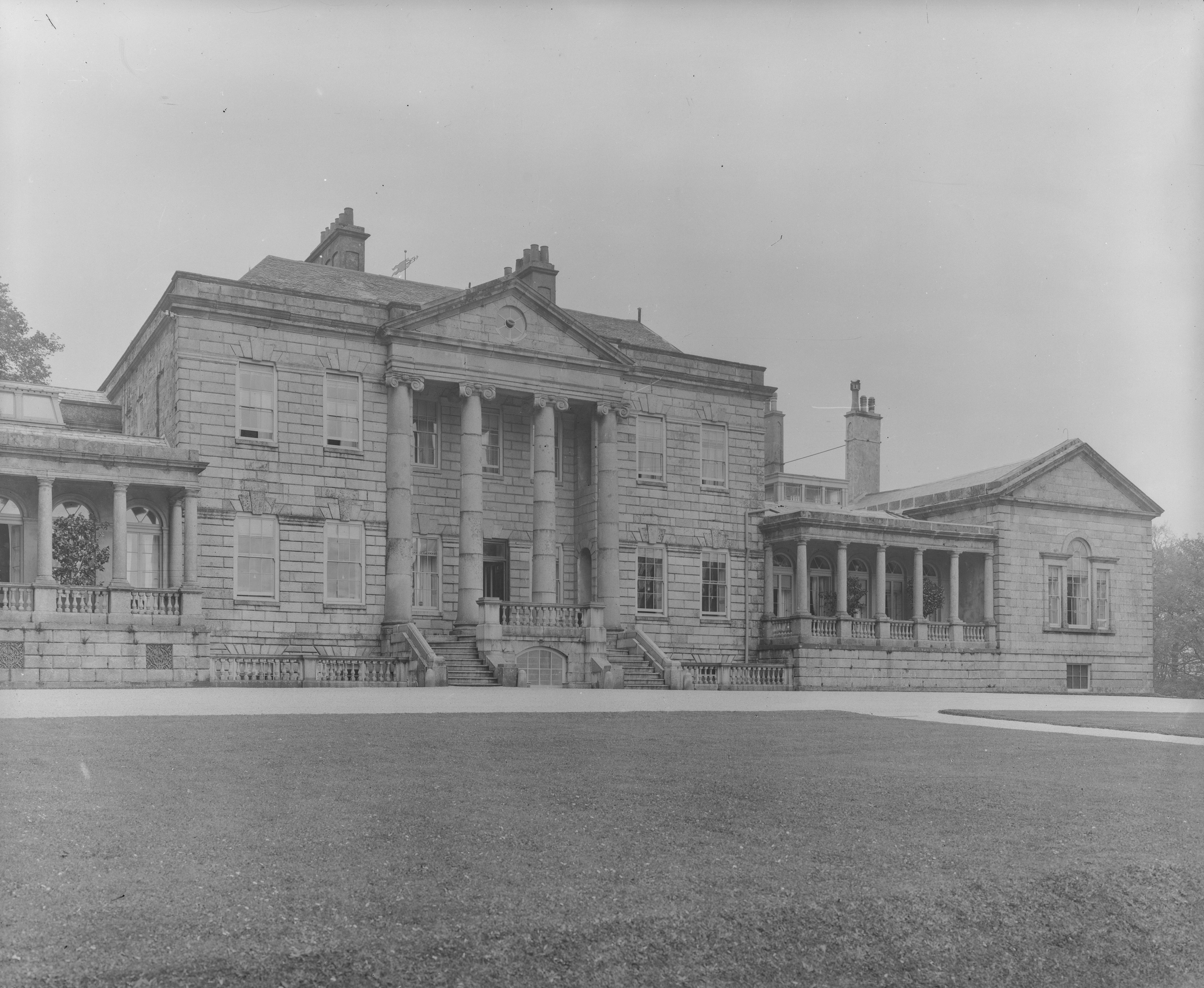 Black and white photographs or a palladian-style house