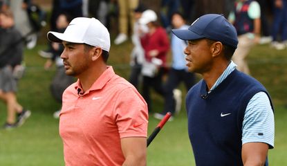 Day and Woods chat during a practice round