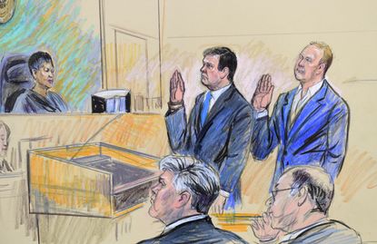 A court artist drawing of former Trump campaign chairman Paul Manafort and his business associate Rick Gates in federal court in Washington.