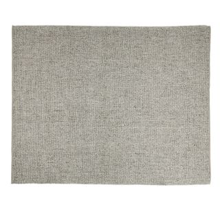 A grey low pile rug