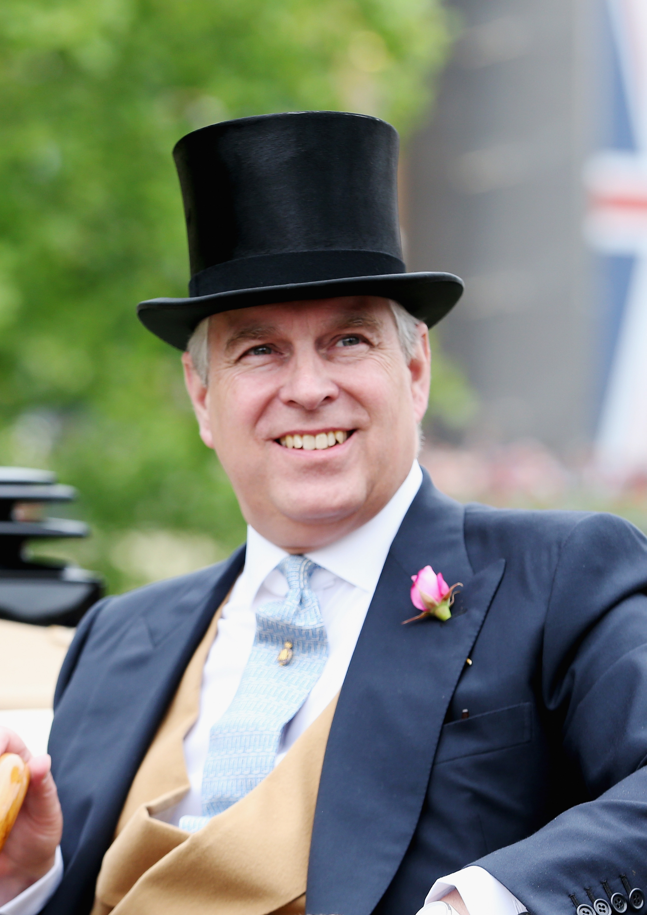 Prince Andrew wearing a suit and tophat at Royal Ascot