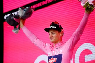 BALATONFURED HUNGARY MAY 08 Mathieu Van Der Poel of Netherlands and Team Alpecin Fenix celebrates winning the pink leader jersey on the podium ceremony after the 105th Giro dItalia 2022 Stage 3 a 201km stage from Kaposvr to Balatonfred Giro WorldTour on May 08 2022 in Balatonfured Hungary Photo by Tim de WaeleGetty Images
