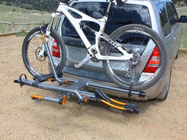 Bikes are quick to load and are held securely in place, though the sloppy main pivot still allows the whole upper assembly a troubling amount of movement when driving down the road