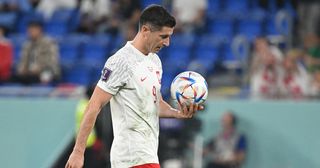 Robert Lewandowski prepares to shoot from the penalty spot during the Qatar 2022 World Cup Group C football match between Mexico and Poland at Stadium 974 in Doha on November 22, 2022.