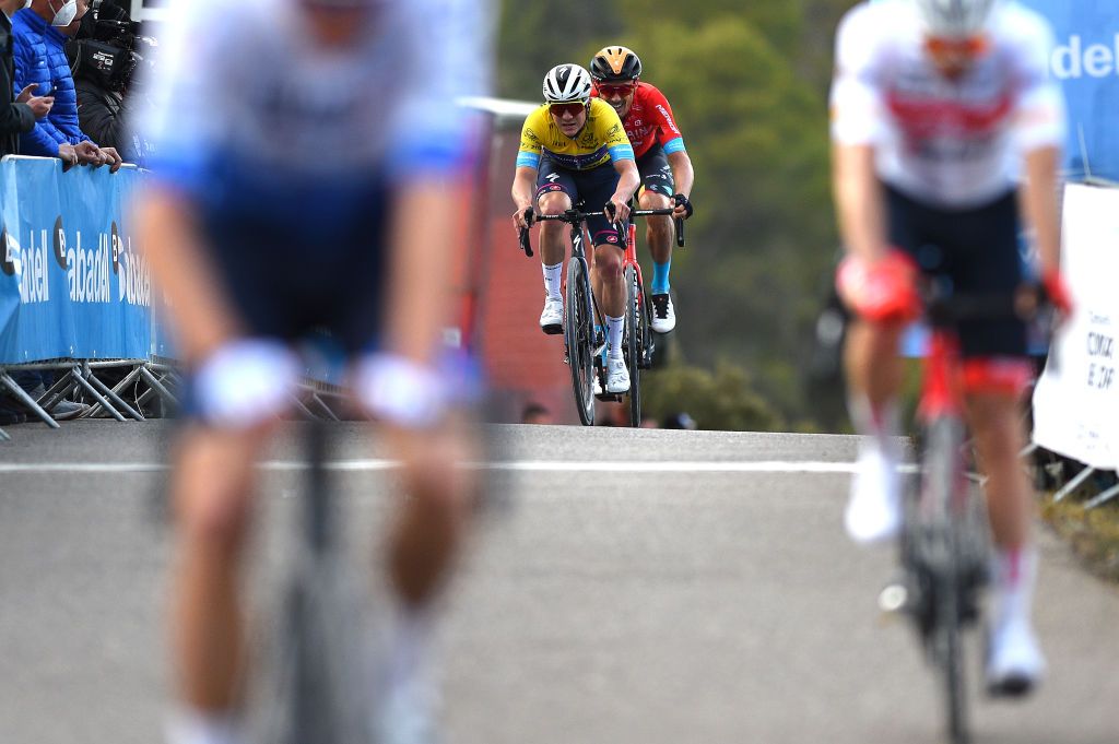 ALTO DE LAS ANTENAS DEL MAIGMO TIBI ALICANTE SPAIN FEBRUARY 04 Remco Evenepoel of Belgium and Team QuickStep Alpha Vinyl Yellow Leader Jersey crosses the finishing line during the 73rd Volta A La Comunitat Valenciana 2022 Stage 3 a 1551km stage from Alicante to Alto De Las Antenas Del Maigmo Tibi 1080m VCV2022 on February 04 2022 in Alicante Spain Photo by Dario BelingheriGetty Images