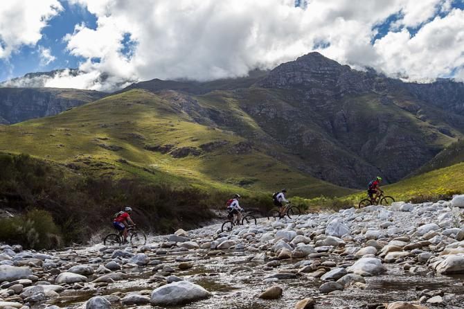 Riders make their way through the rivers and over the mountains during stage 4
