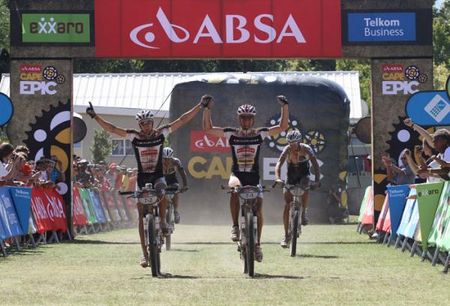 Konny Looser and Urs Huber of Stockli Pro celebrate after finishing second during stage 1