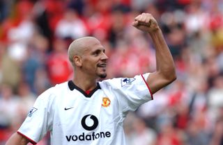 Rio Ferdinand celebrates a Paul Scholes goal for Manchester United against Charlton Athletic in September 2002.