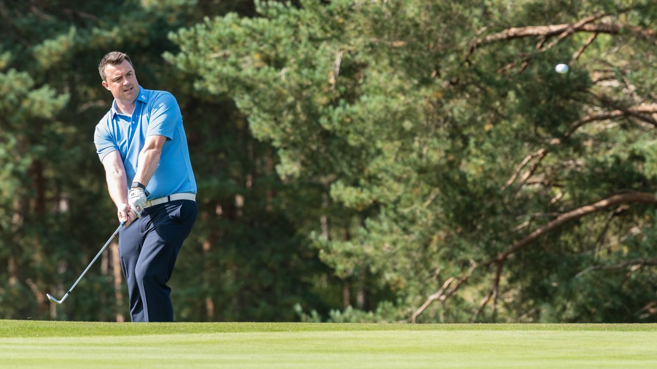 Tom Clarke playing golf