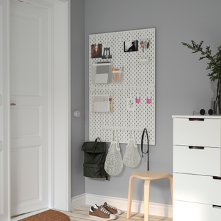 The IKEA Skadis pegboard is perfect for your hallway storage