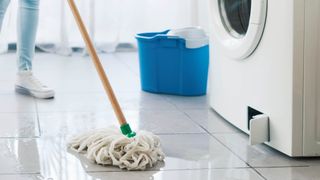 Mopping up water from a washing machine