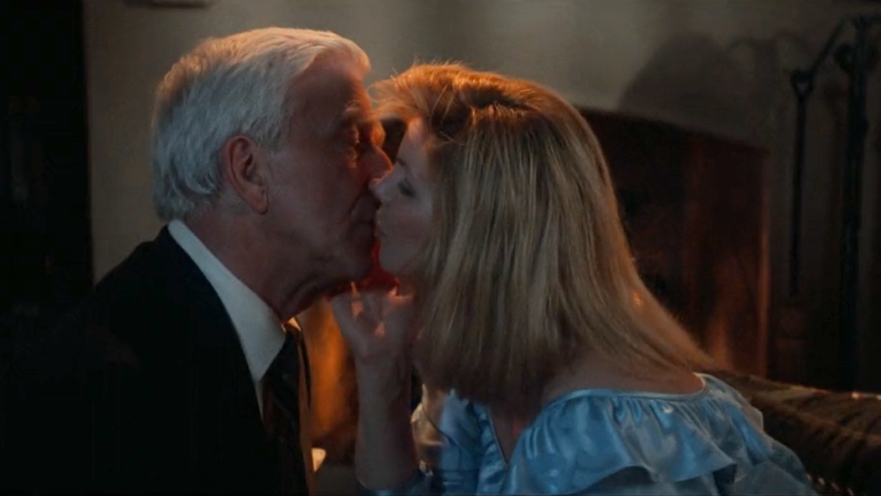 Frank and Jane kissing.