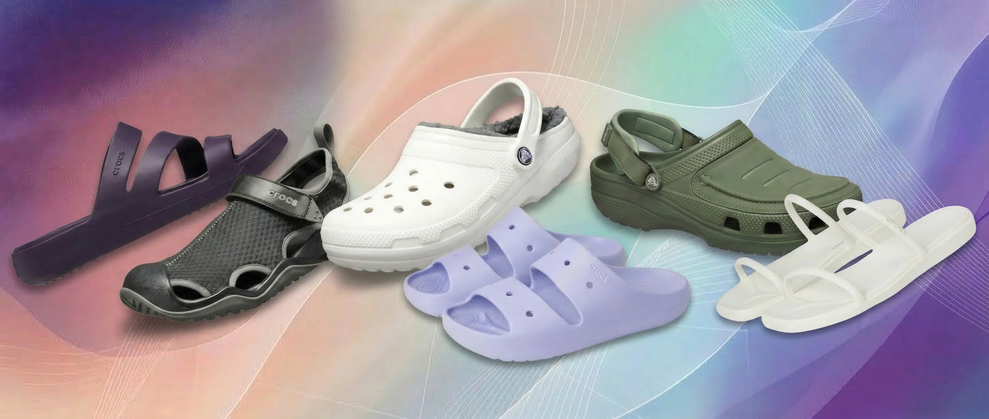 Crocs on display with rainbow gradient background