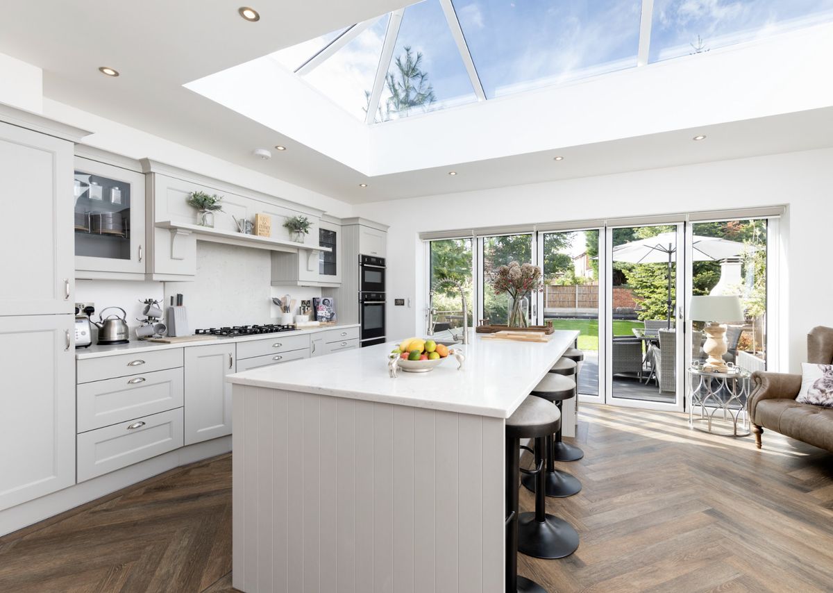 A kitchen extension with a rooflight and a large kitchen island
