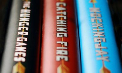Complaints about "The Hunger Games" books' objectionable content and their place in school libraries have only increased since the popular movie's release.