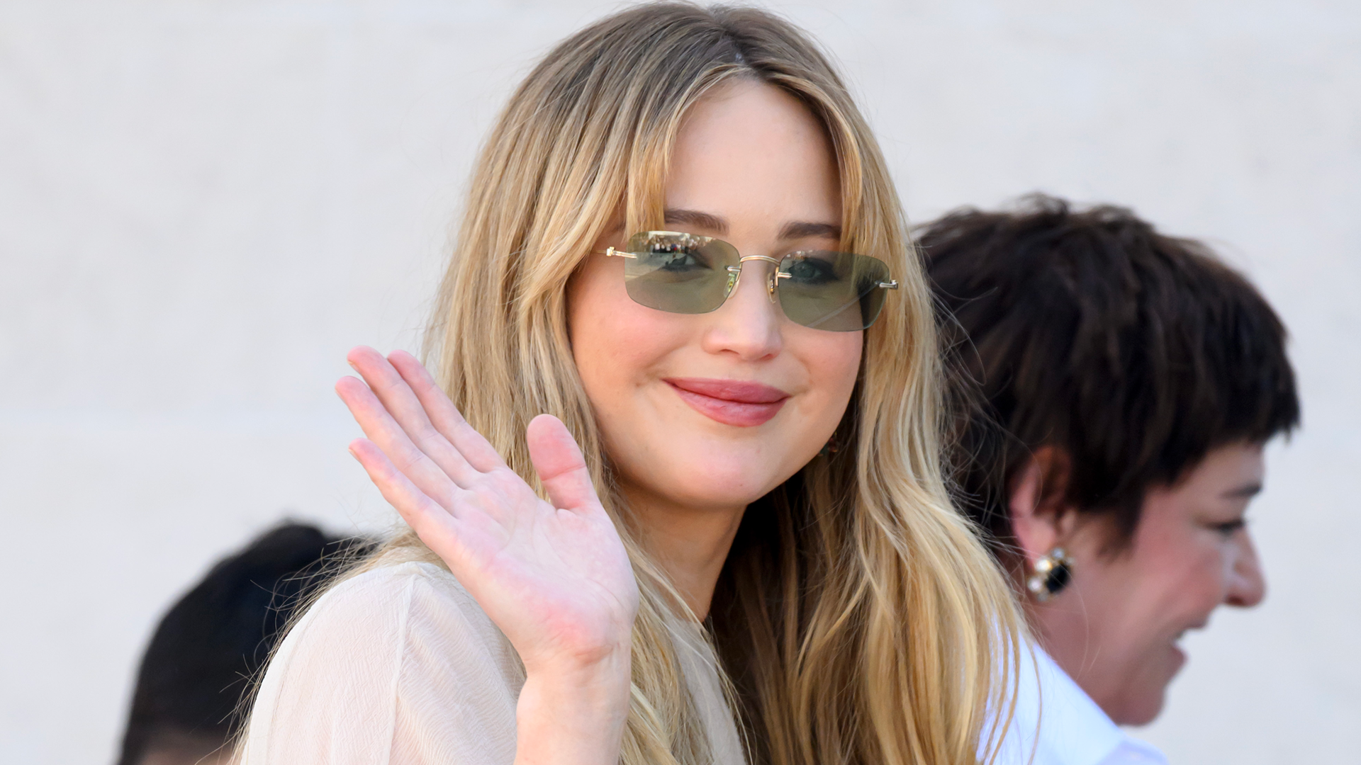 Jennifer Lawrence wore an all-white outfit with a Dior Saddle Bag in NYC