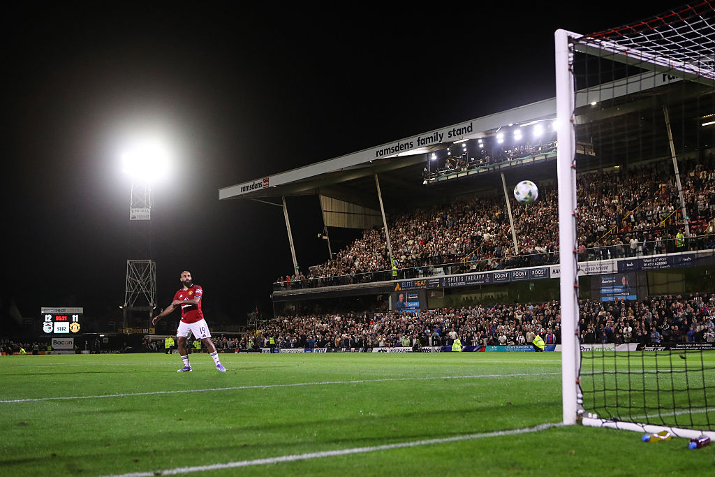 Bryan Mbeumo of Manchester United misses the decisive penalty in the penalty shoot out during the Carabao Cup Second Round match between Grimsby Town and Manchester United at Blundell Park on August 27, 2025 in Grimsby, England.